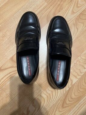 Prada Black Leather Penny Loafers with Red Logo Insole